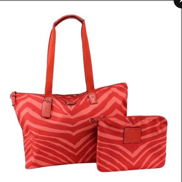 Coach Handbags - Coach "Rare" Zebra Print Orange Weekend/Travel Bag